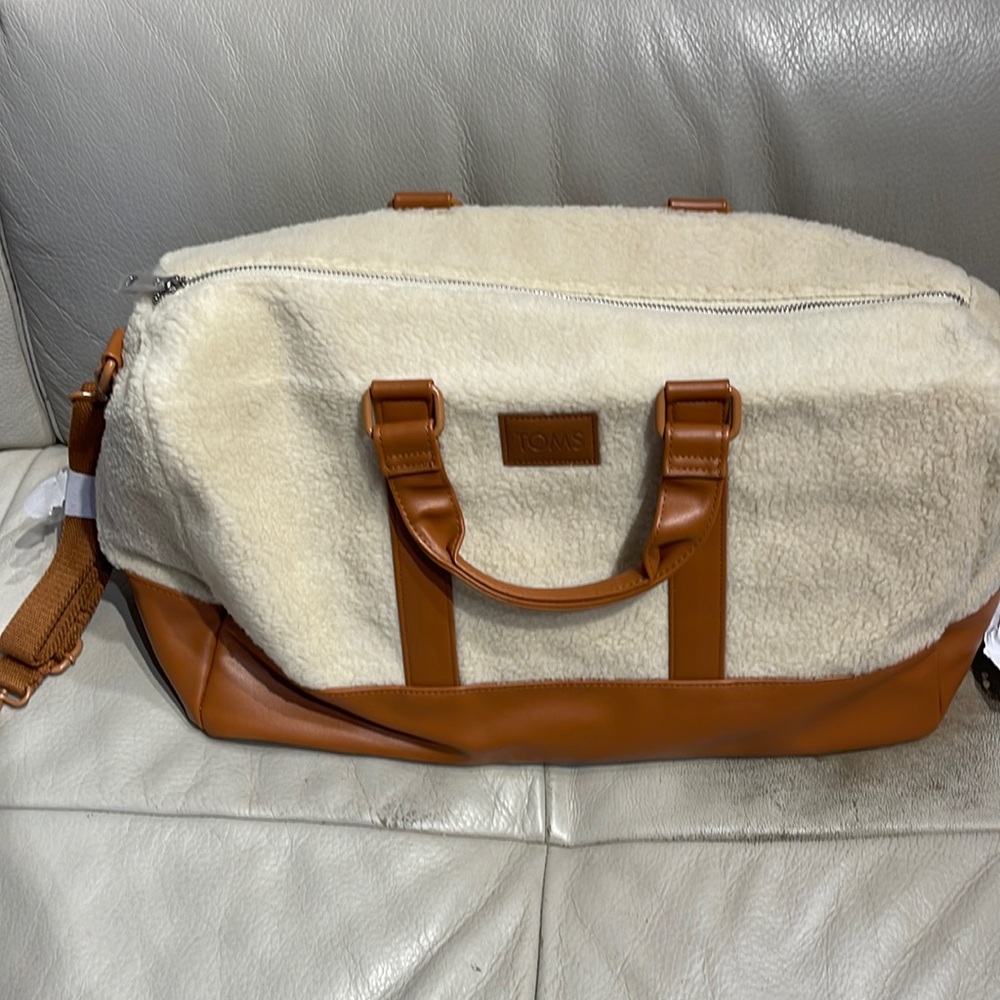 Brand new Toms sherpa duffle bag - NEVER USED